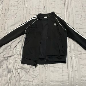 Adidas jacket/sweater. Black with white strips.